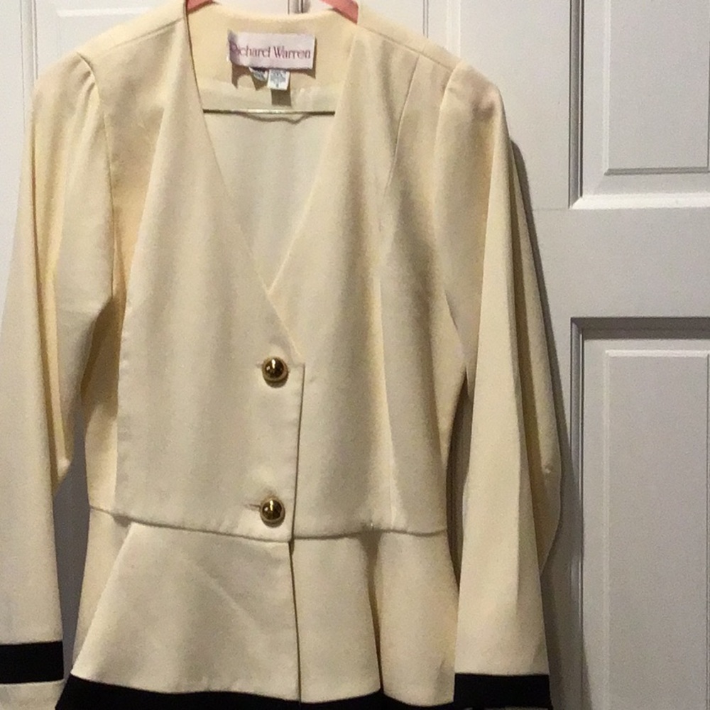 Peplum style cream colored suit jacket